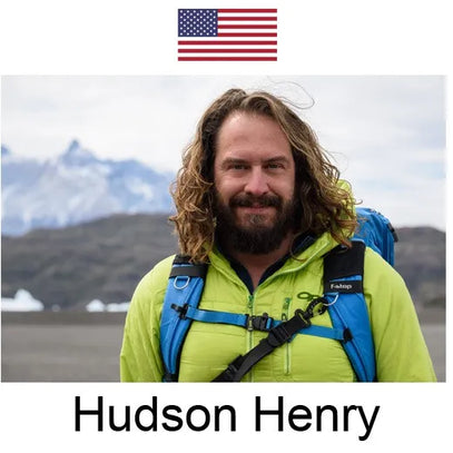 This image shows Hudson Henry (in a bright green jacket, blue backpack) smiling against a snow-capped mountain backdrop. A US flag sits above, and his name is labeled below.