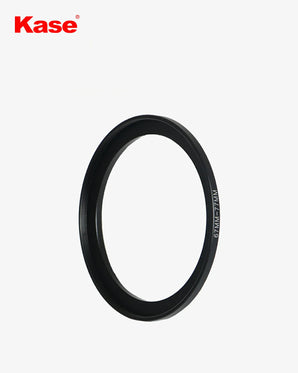 Black camera lens filter with brand 'Kase' on a white background