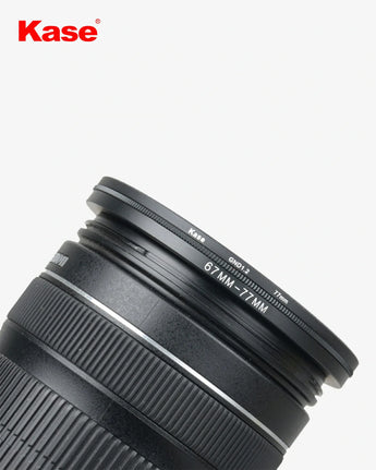 Camera lens with a lens hood featuring Kase branding on a white background