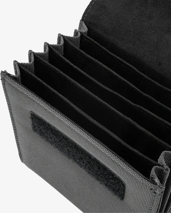 Black tactical pouch with multiple compartments on a white background