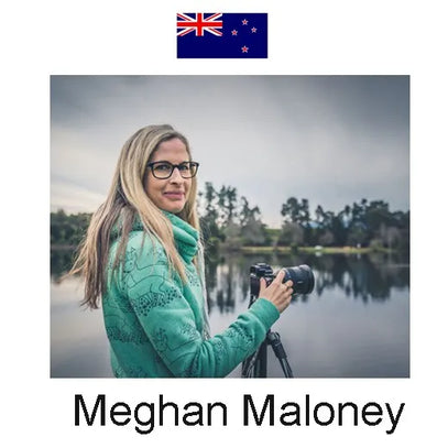 This image shows Meghan Maloney (in a teal patterned sweater, glasses) holding a camera by a lake, with trees and overcast skies in the background. A New Zealand flag sits above, and her name is labeled below.