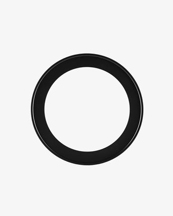 Black circular object on a white background